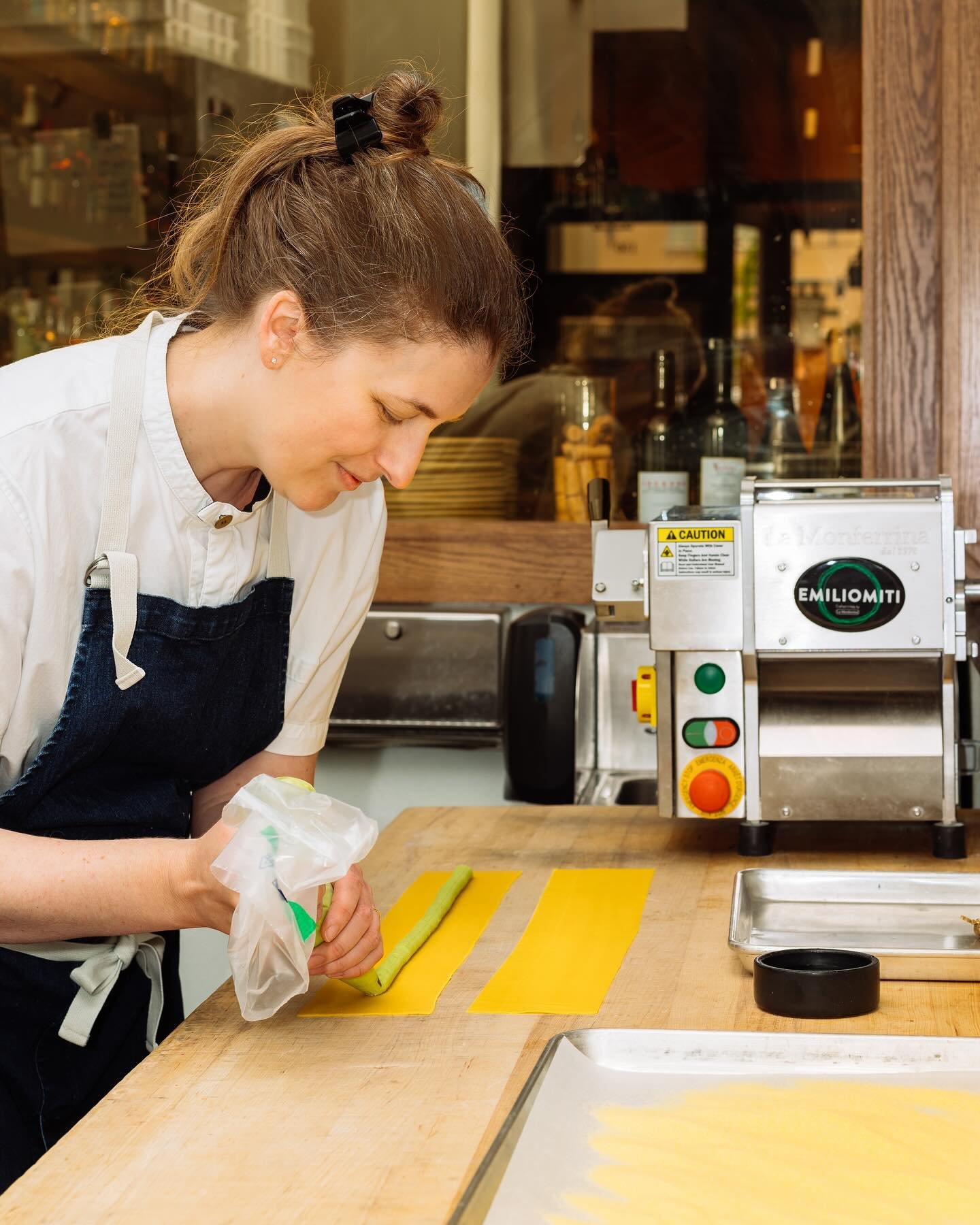 Have you met Chef Honey? @honeygraceholistic 👋🏼 
If you&rsquo;ve had any of @moltiamicihbg home-made pastas, you&rsquo;ve probably enjoyed her work. 🔥 
Pictured: Honey making our Coronetto dish 🤤 
We are honored to have Honey as part of the Molti