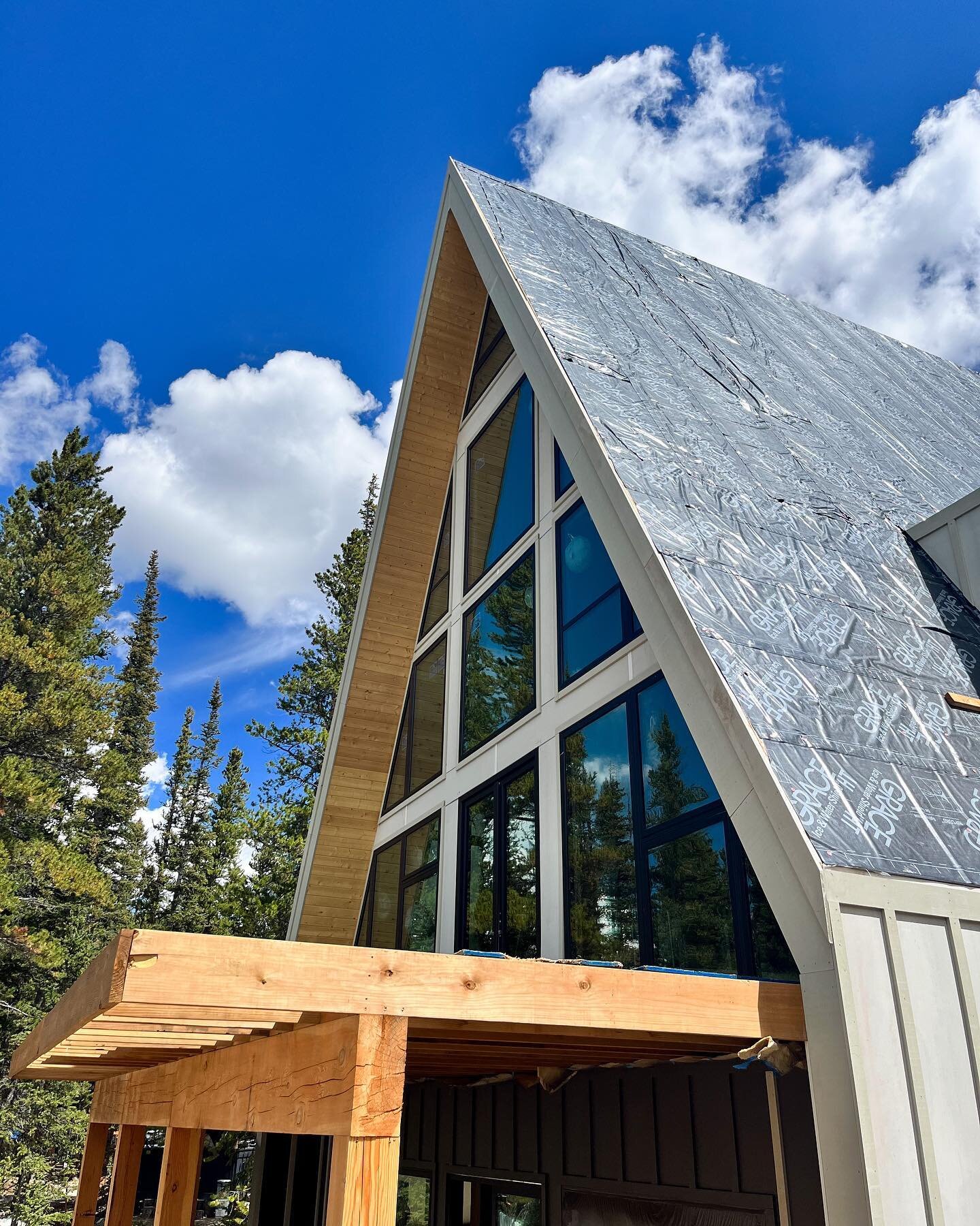 A couple weeks ago Daly visited Dave &amp; Shanna McCann at their A-frame-in-progress in Colorado to finally meet face to face, chat with their contractor, and tour the house! Set against a truly breathtaking backdrop of mountains, pines, and the big