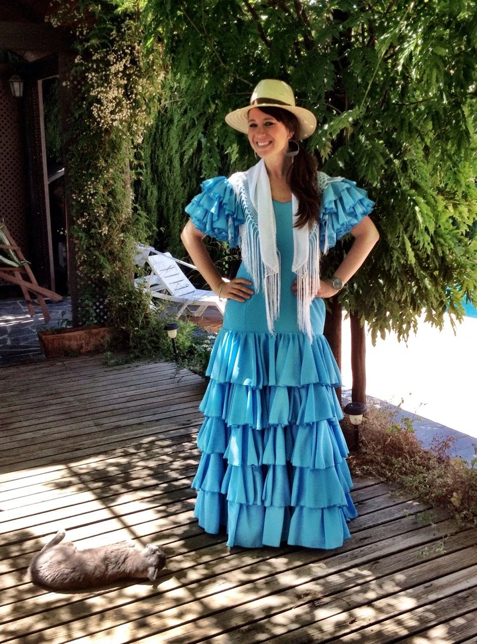 Retreat Host Miriam dressed in a traditional flamenco dress in Granada Spain