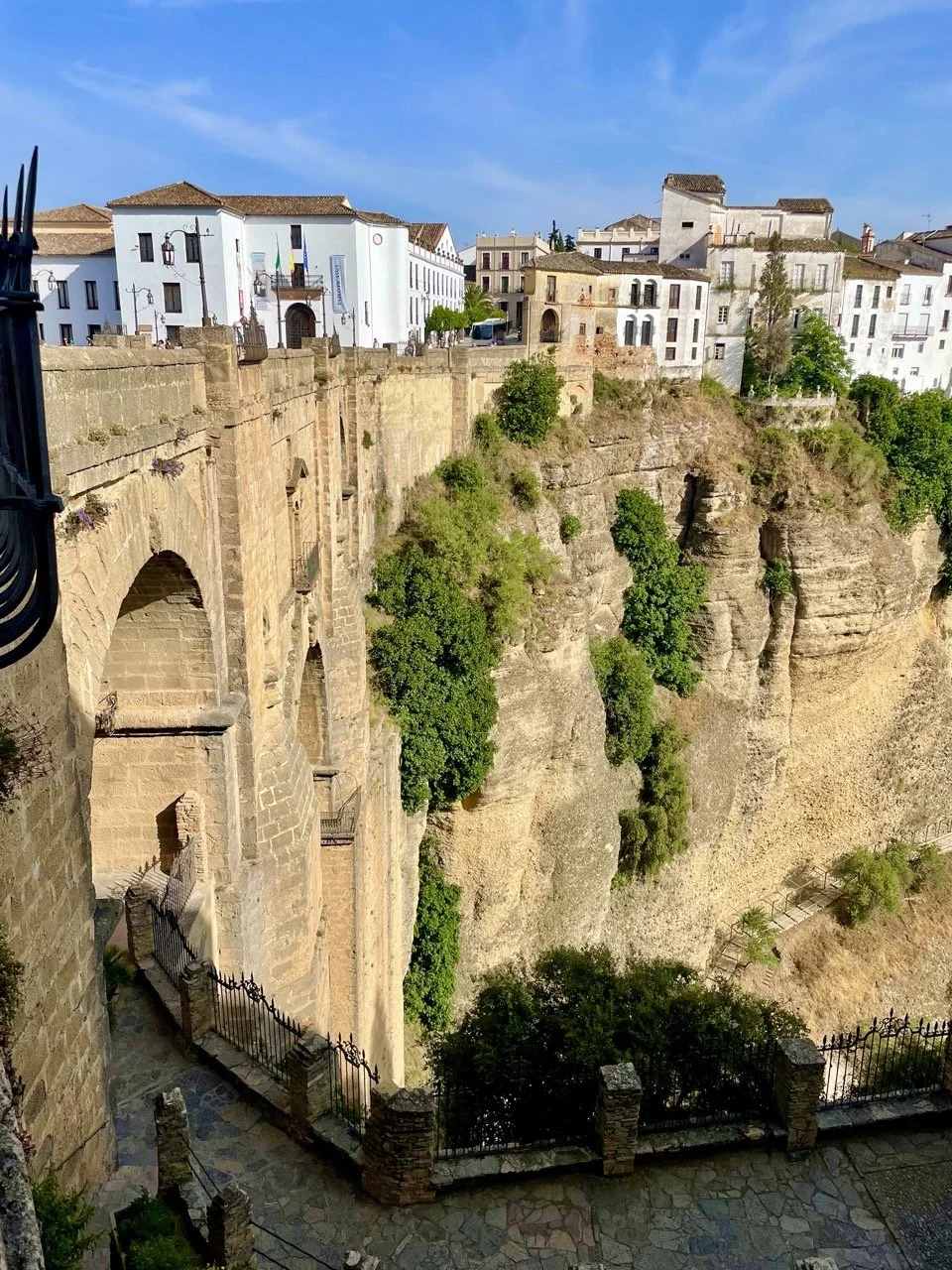 Ronda’s Puente Nuevo bridge over El Tajo gorge, a cultural highlight near our yoga and walking retreat in Andalusia.