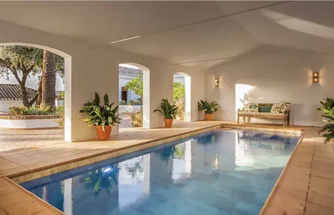 Indoor swimming pool at the Andalusian villa, offering relaxation and comfort during your yoga retreat stay.