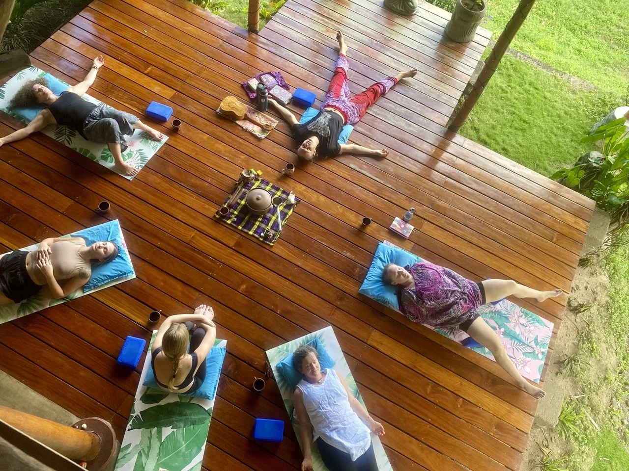 Guests participating in a cacao ceremony and mindfulness workshop at Villa Laguna Yoga & Detox Retreat in Nicaragua.