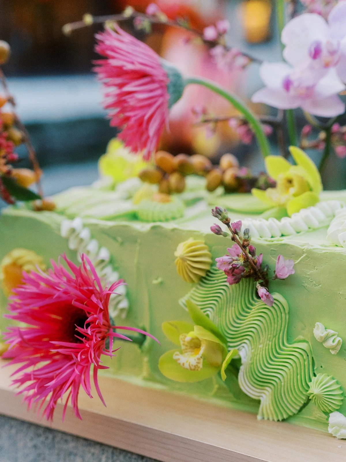 Close up of floral details on a custom bachelorette cake inspired by garden textures and color.