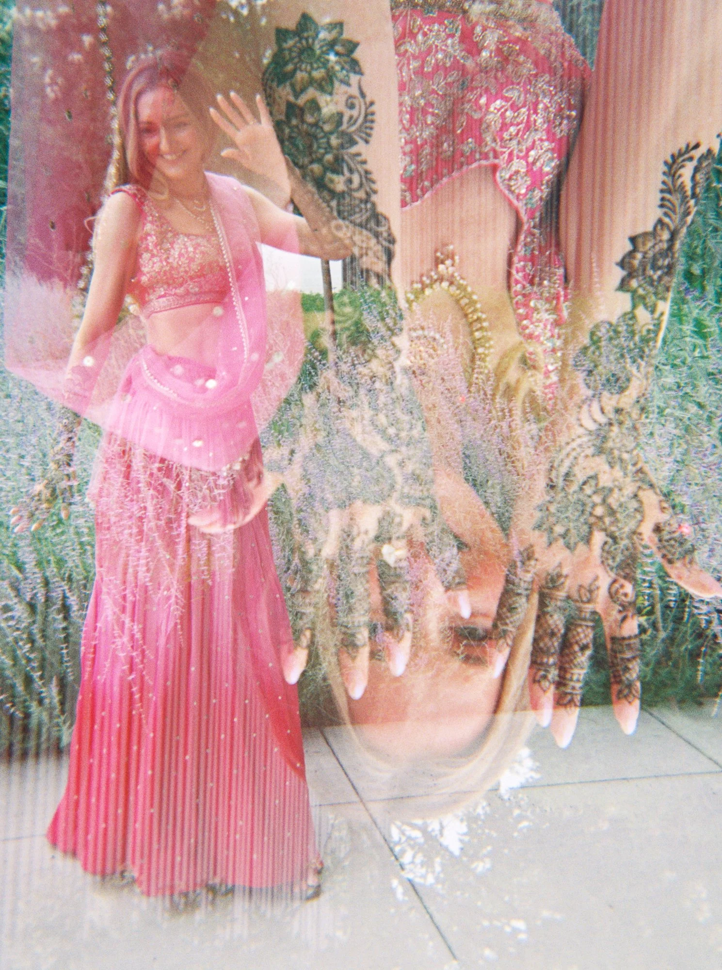 Artistic double-exposure portrait of Alacia in pink layered with close-up details of her Mehndi designs.