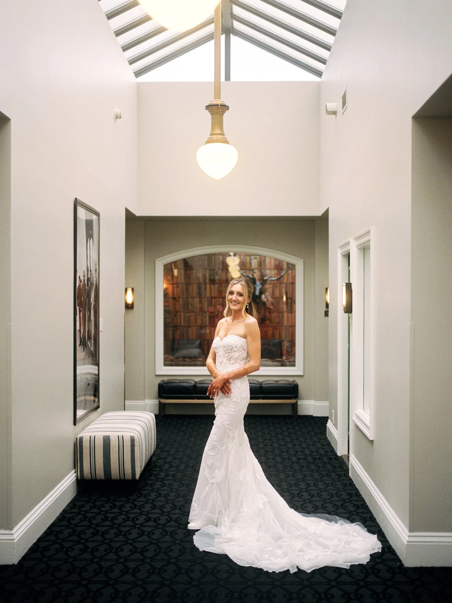 Alacia posing in the hallway at the Sentinel Hotel in Portland