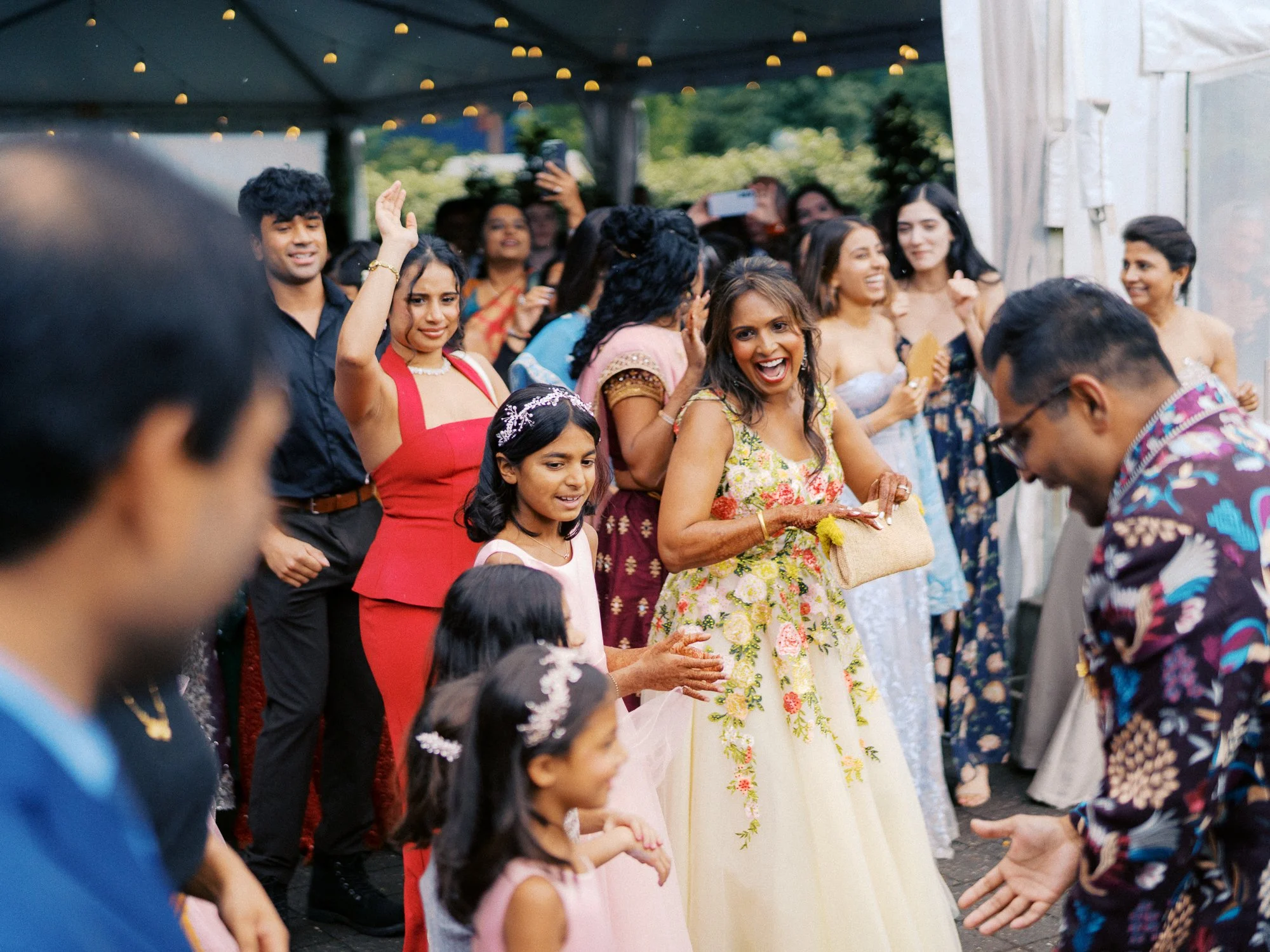 Groom dances with family and friends during the outdoor wedding reception at Castaway Portland.