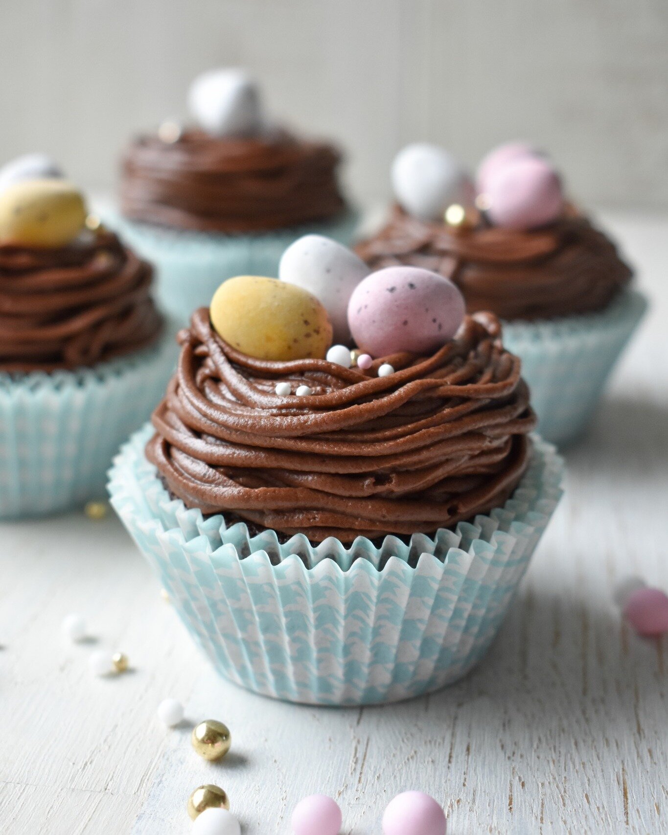 Easter is nearly here! 
Fun little Easter cucpakes I made today. They were nice and simple, below are the steps I followed. 

1. Make your favourite cupcakes (or you could buy your favourite from the store). 
2. 1tbsp soft butter + 2tbsp cocoa + 1 1/