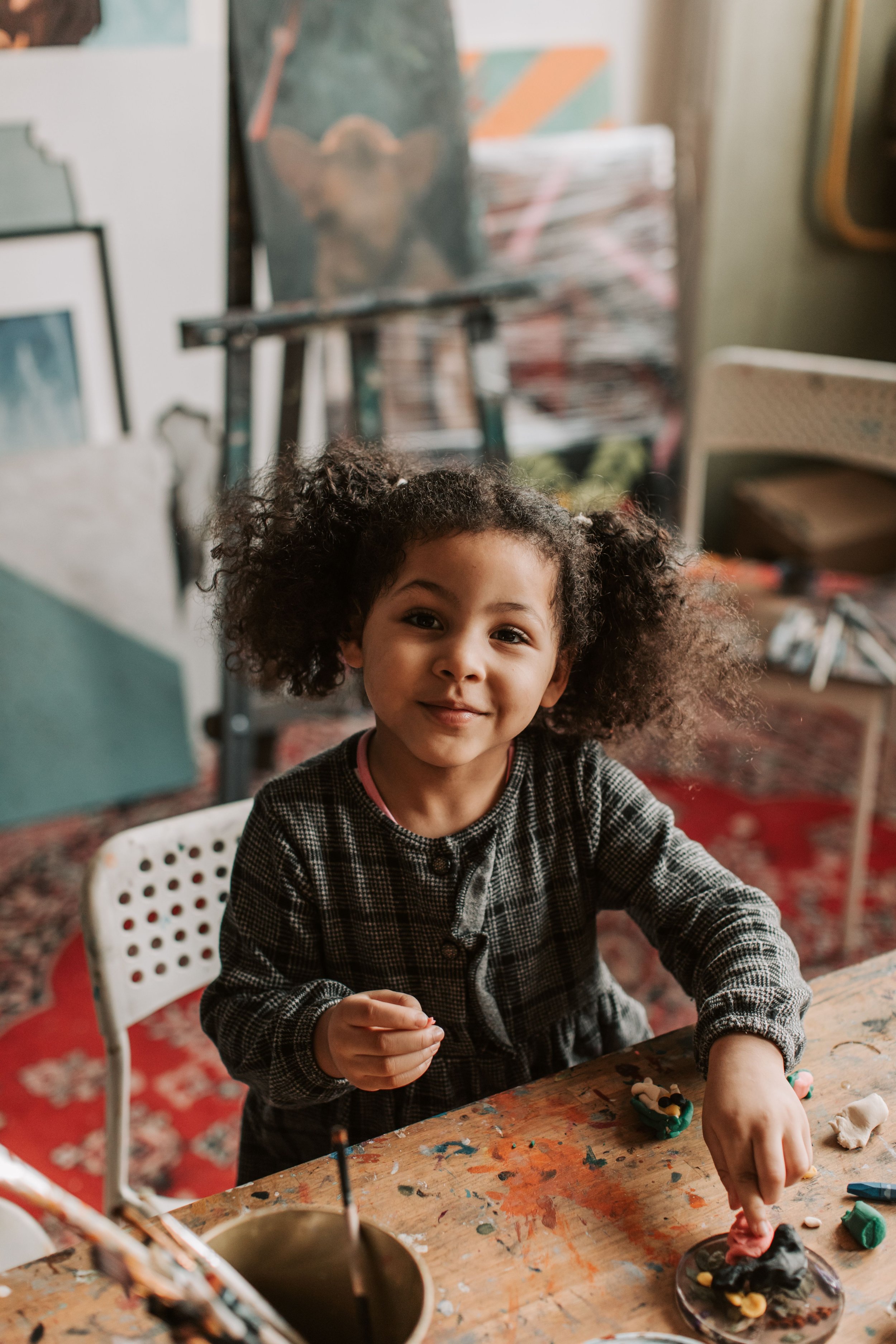 Black Child In Durham, NC Smiling and Playing