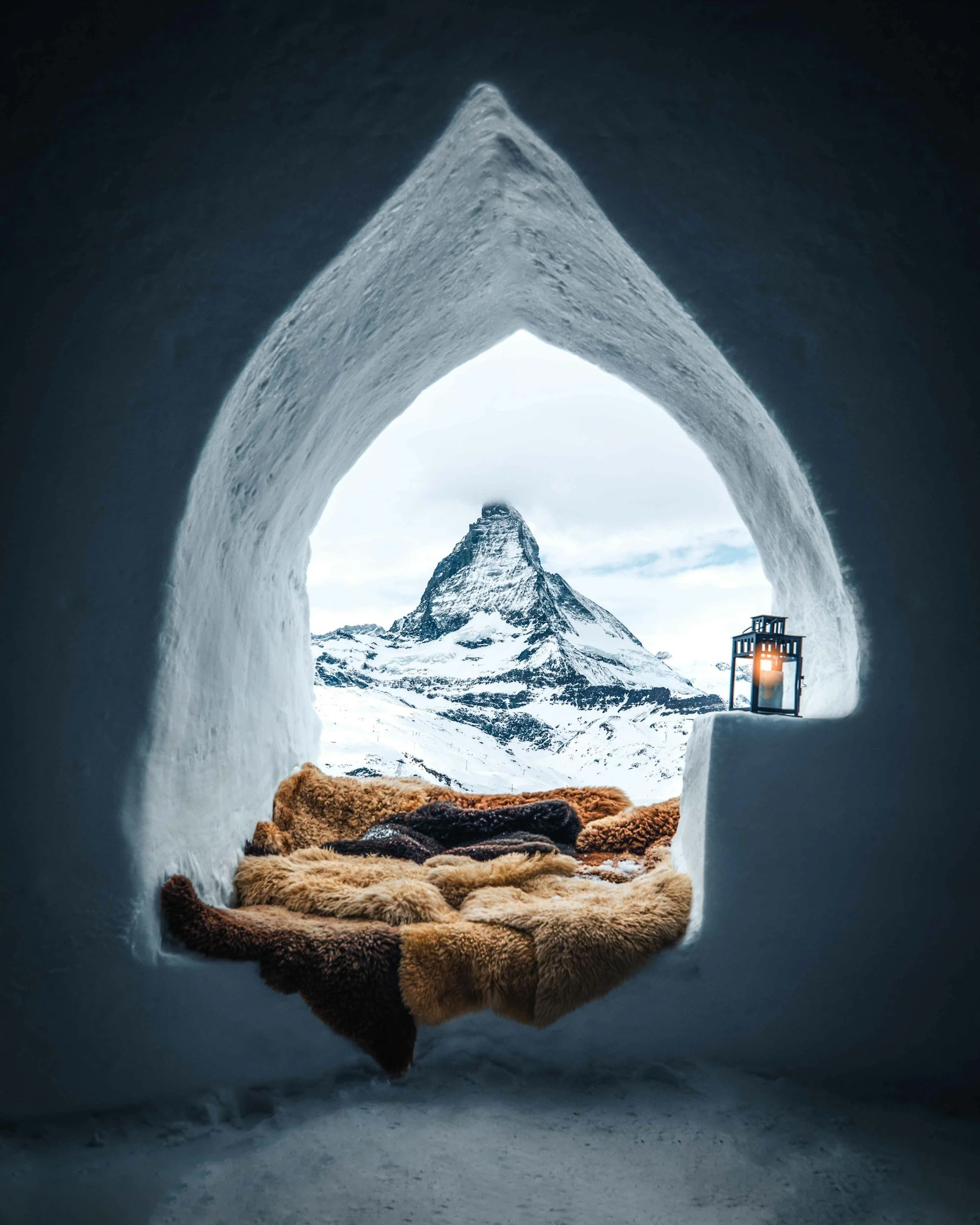 A luxury igloo hotel with view of an icy mountain