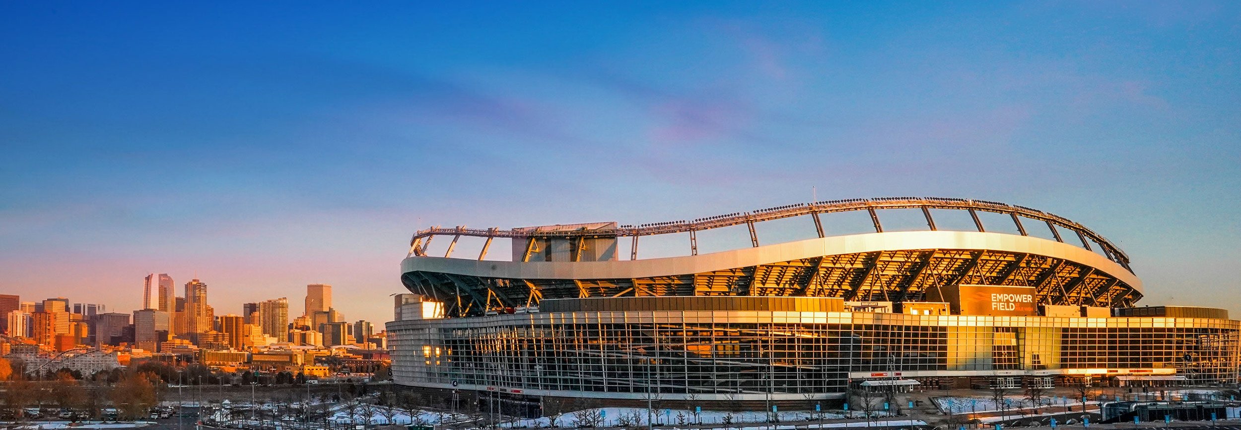 Empower Field_stadium_exterior_sunset.jpeg