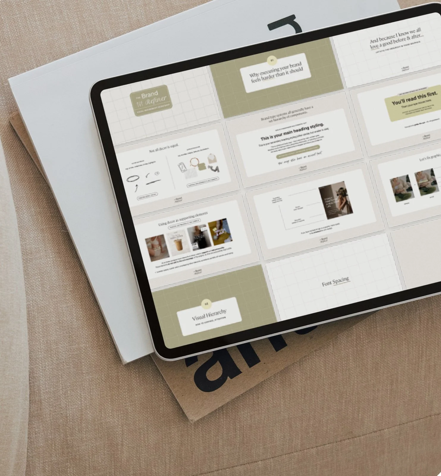 An iPad displaying a grid of presentation slides, with a white box and beige and white background, placed on a cardboard box and a beige textured surface.