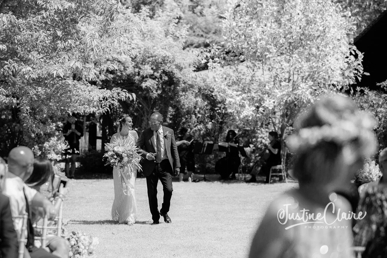 brides arrival at the outdoor ceremony