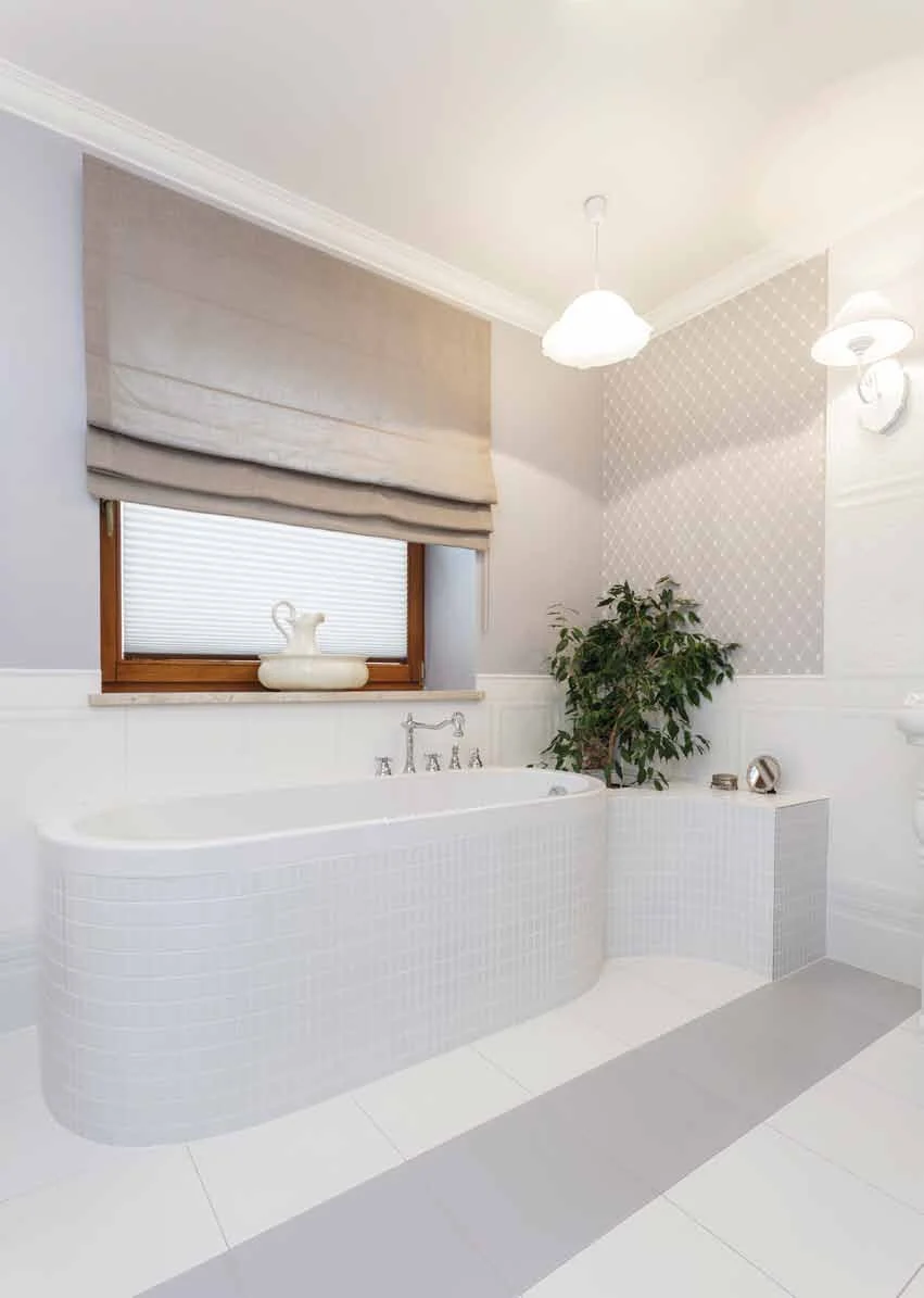 Bright roman blinds in bathroom