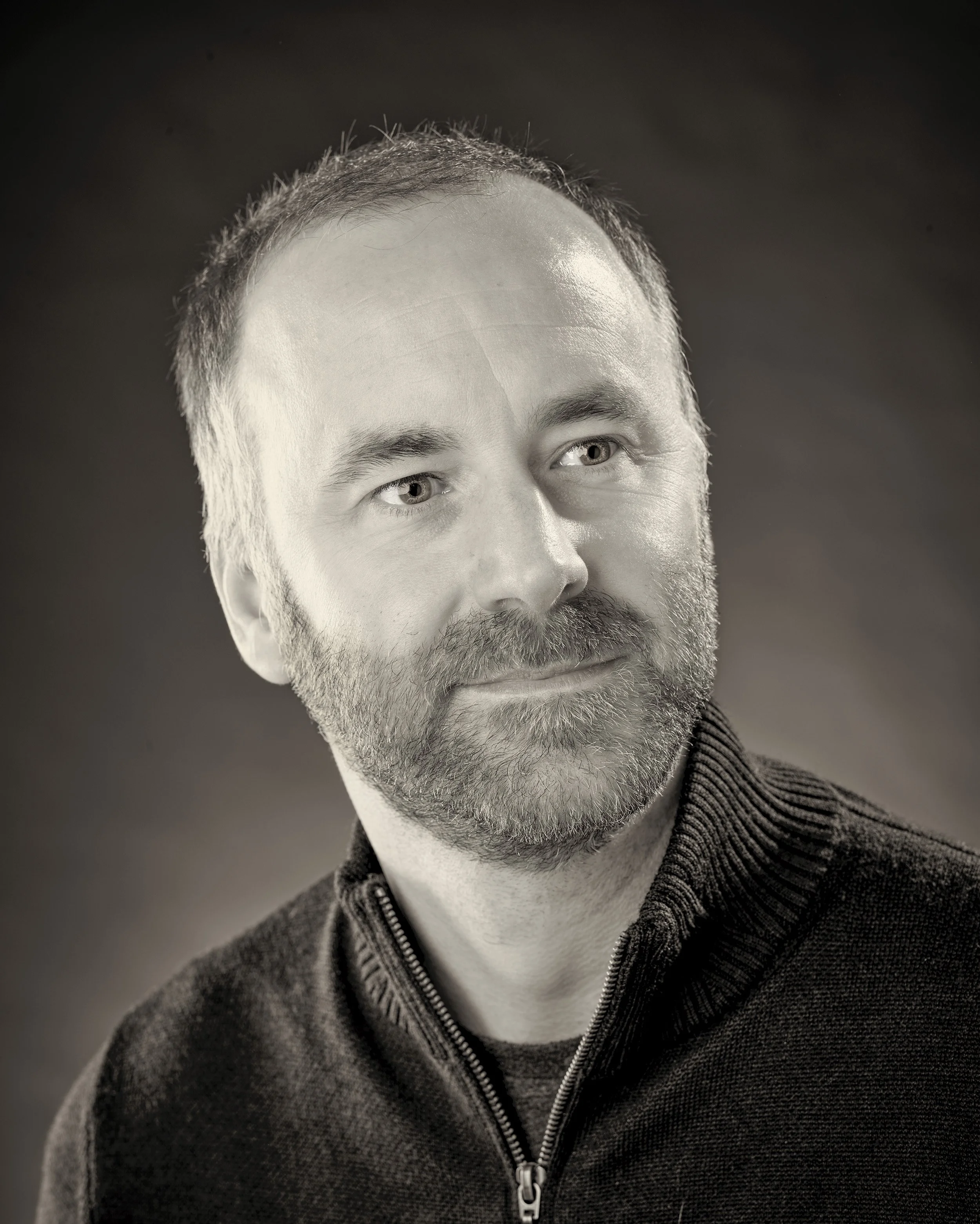 Black and white photograph of Phil Crowton, Director of White Crow Studios