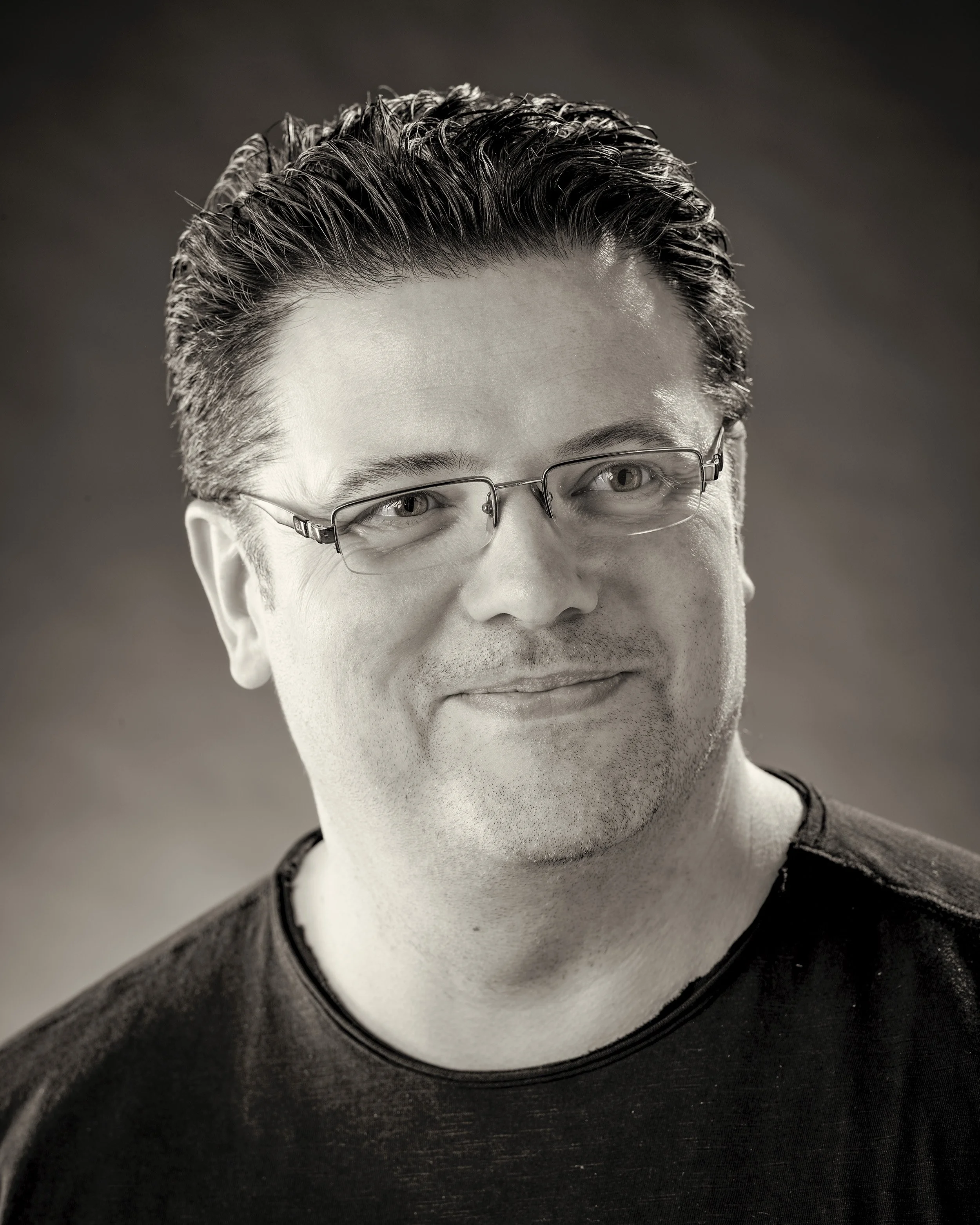 Black and white photograph of Matt James, Creative Director of White Crow Studios