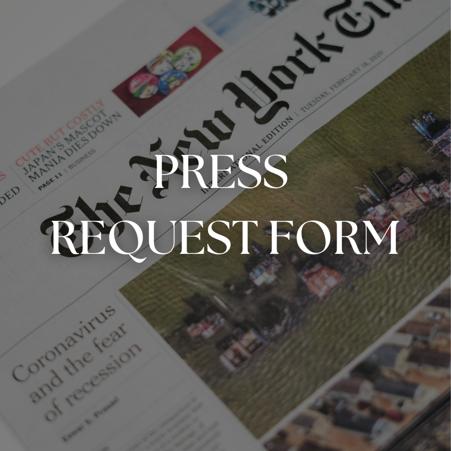 A newspaper with the headline 'The Daily Worker,' showing a photograph of houses and a smaller headline about coronavirus.