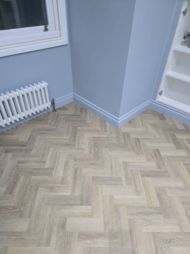 Beckenham LVT parquet flooring living room.jpg