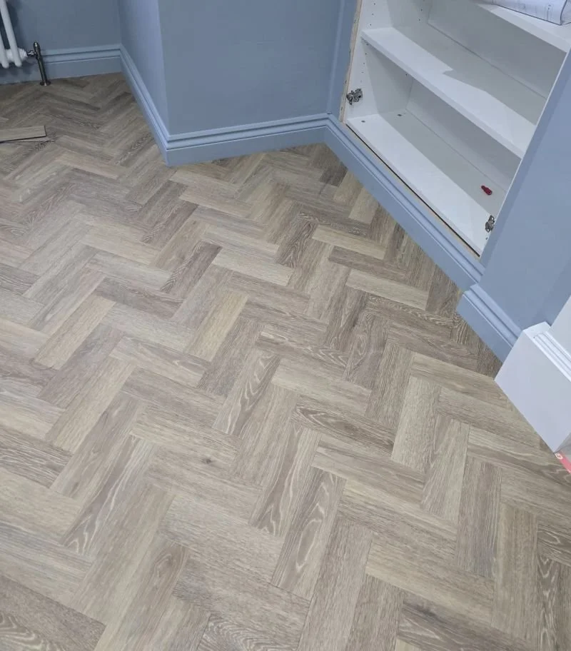 Living room Beckenham LVT parquet flooring.jpg