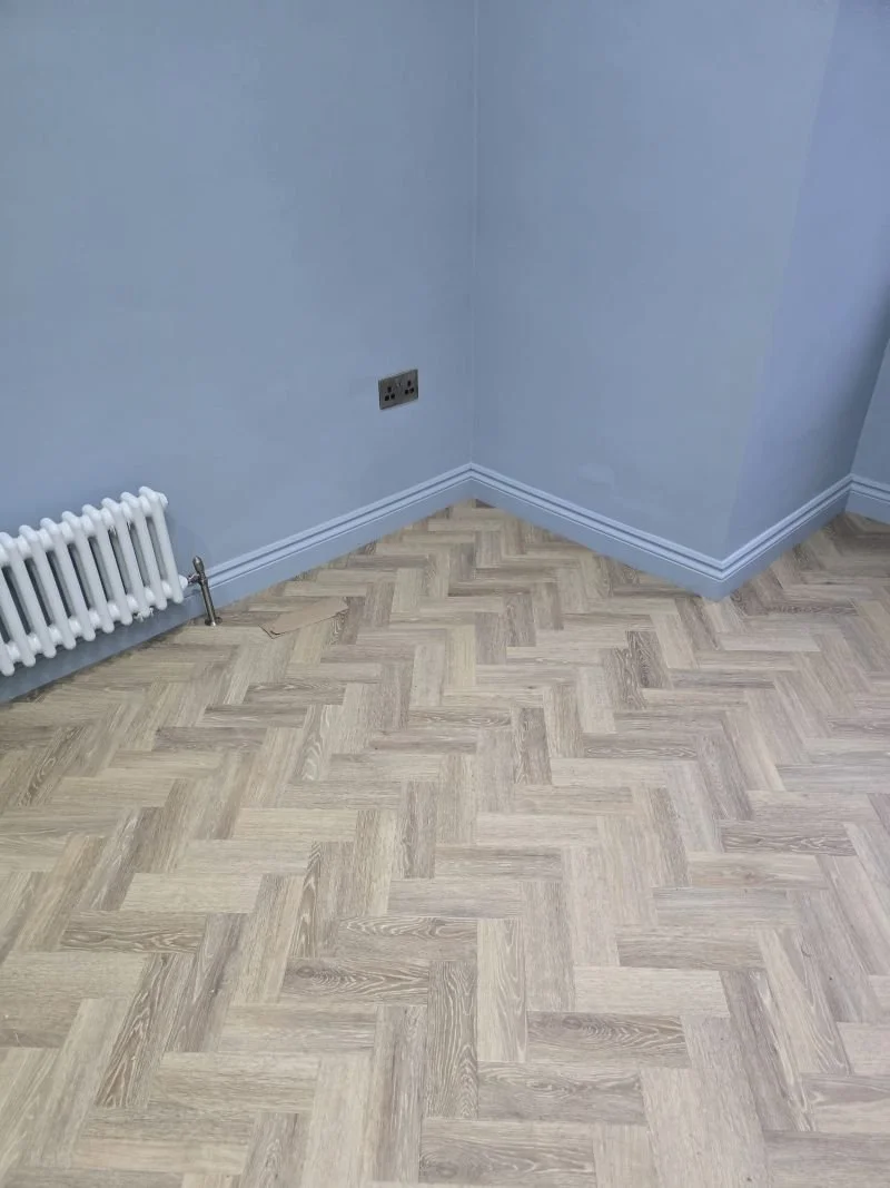 LVT parquet flooring Beckenham living room.jpg
