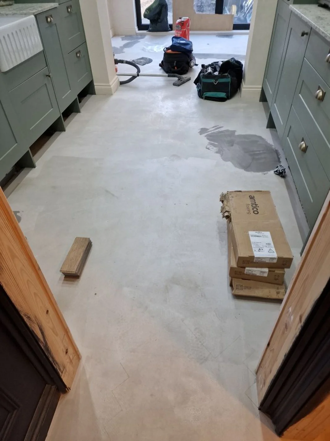 Beckenham LVT flooring smoothing compound living room.jpg