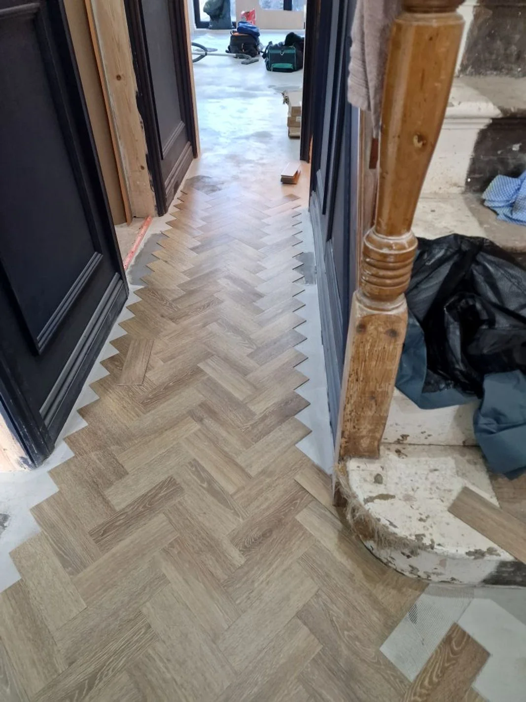 Beckenham parquet LVT flooring hallway.jpg