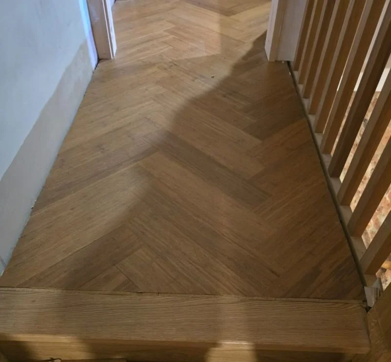 Bamboo flooring to landing Dulwich with nosing.jpg