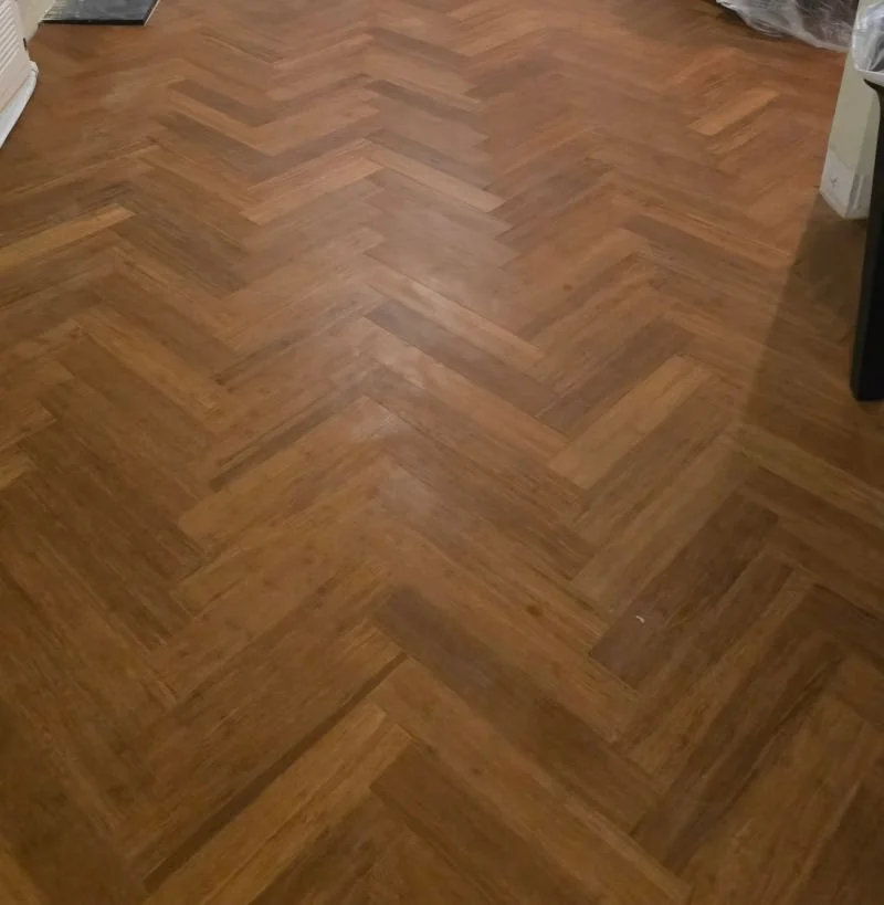 Bamboo flooring in herringbone design living room Dulwich.jpg