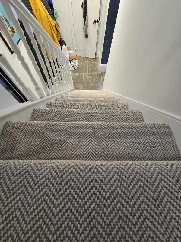 Herringbone design flatweave carpet to stairs Bromley Kent.jpg