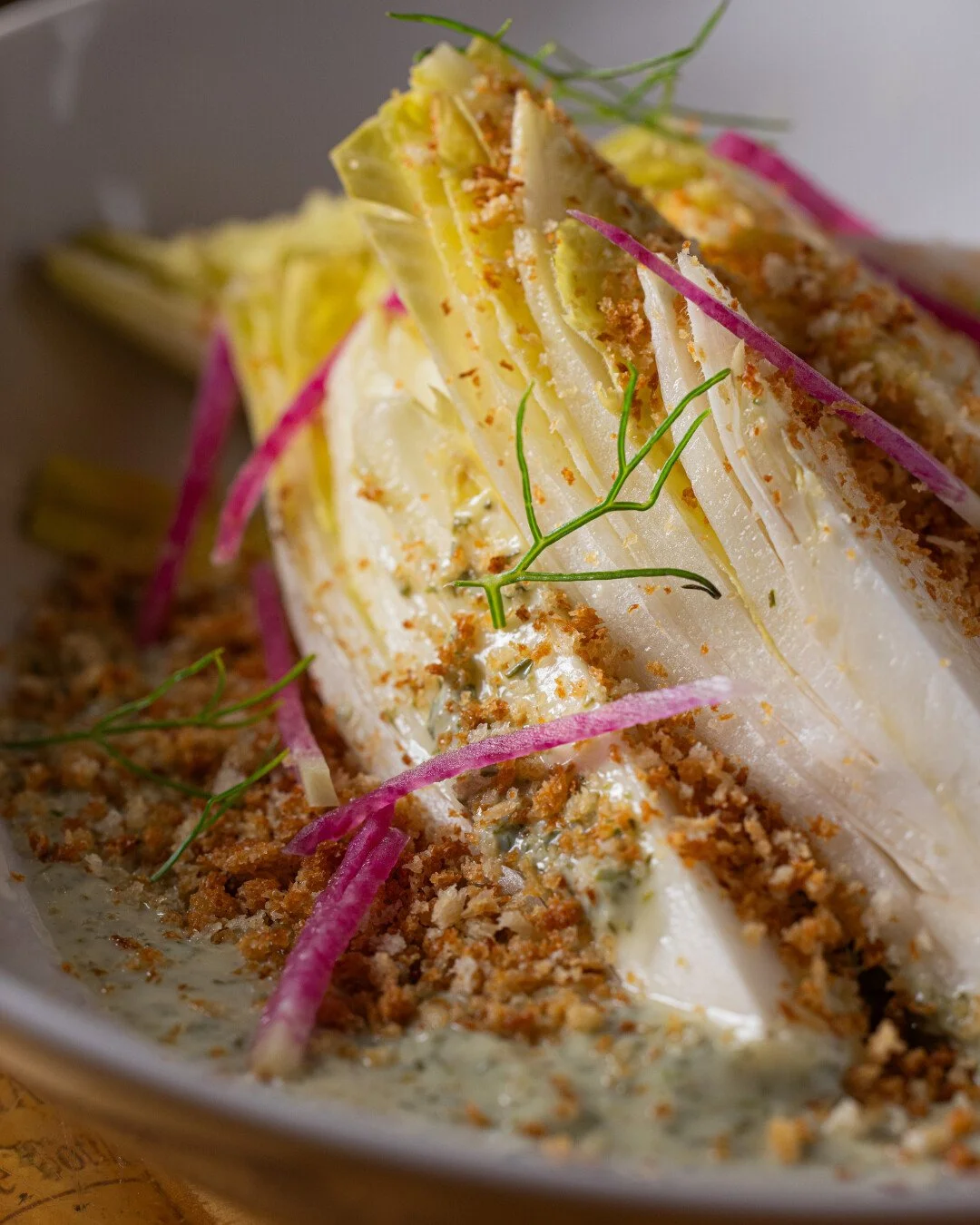 The perfect addition to happy hour. 🥂🌿

BELGIAN ENDIVE SALAD
Watermelon radish, feta, fresh dill, green goddess &amp; toasted breadcrumbs.

Fresh, crisp, and made for pairing with your favorite happy hour drink. 🍷