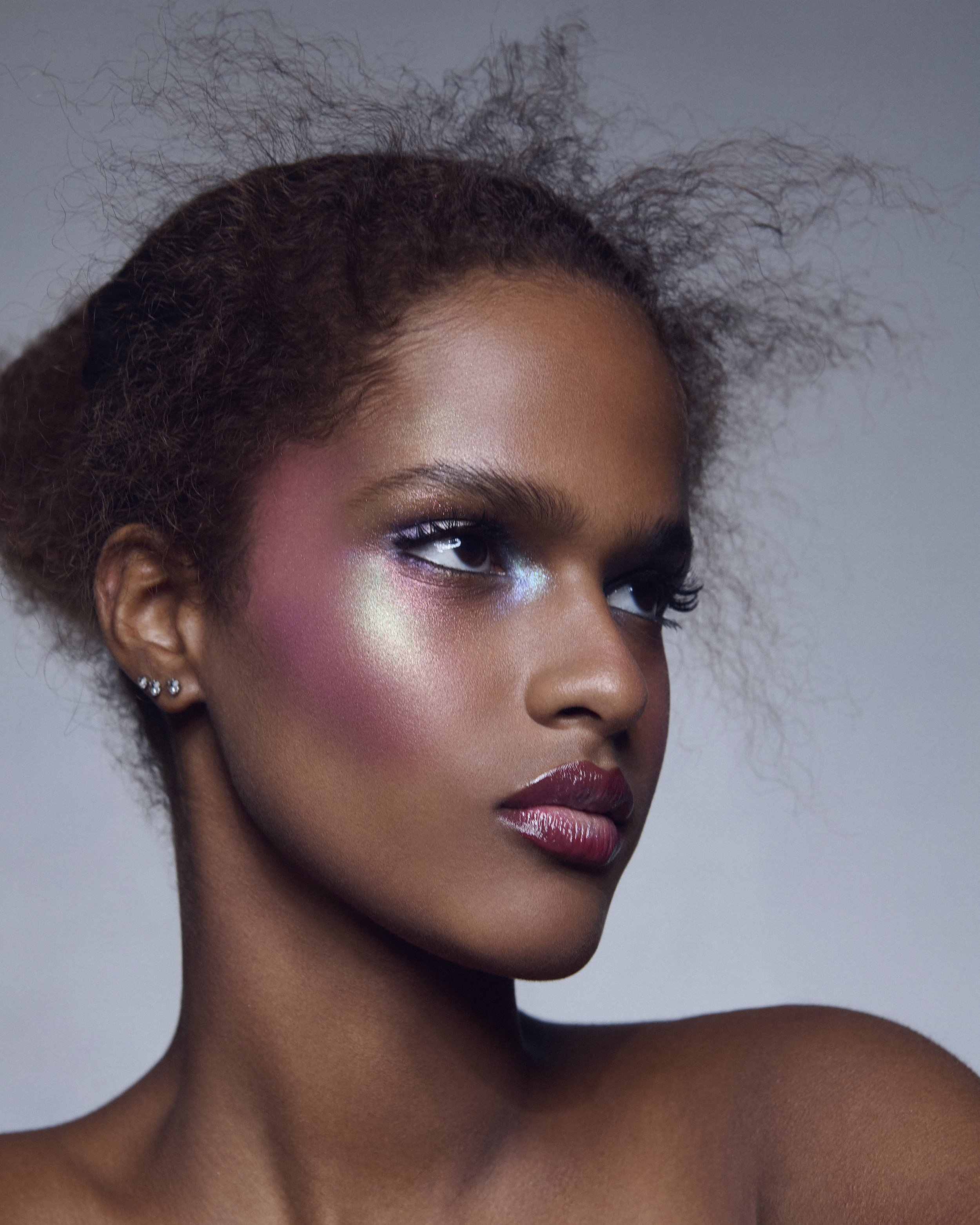 Creative editorial shimmer makeup 