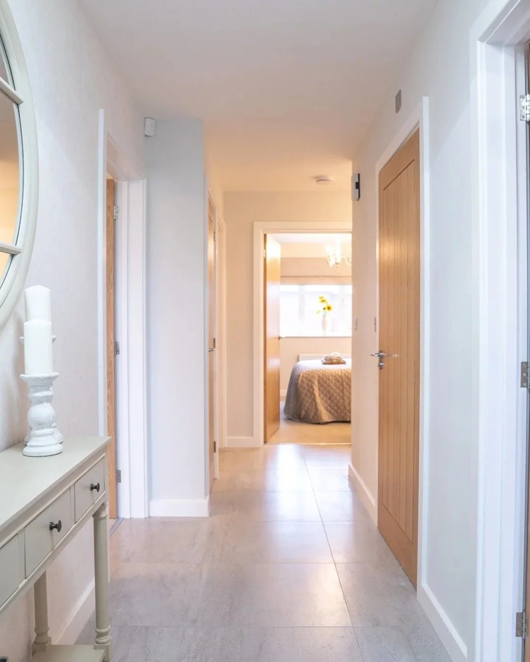 Light-filled hallways set the tone the moment you walk through the door.

They're more than just a space to pass through, they're the first impression of home.

Natural light, soft neutral walls and considered proportions create a sense of openness a