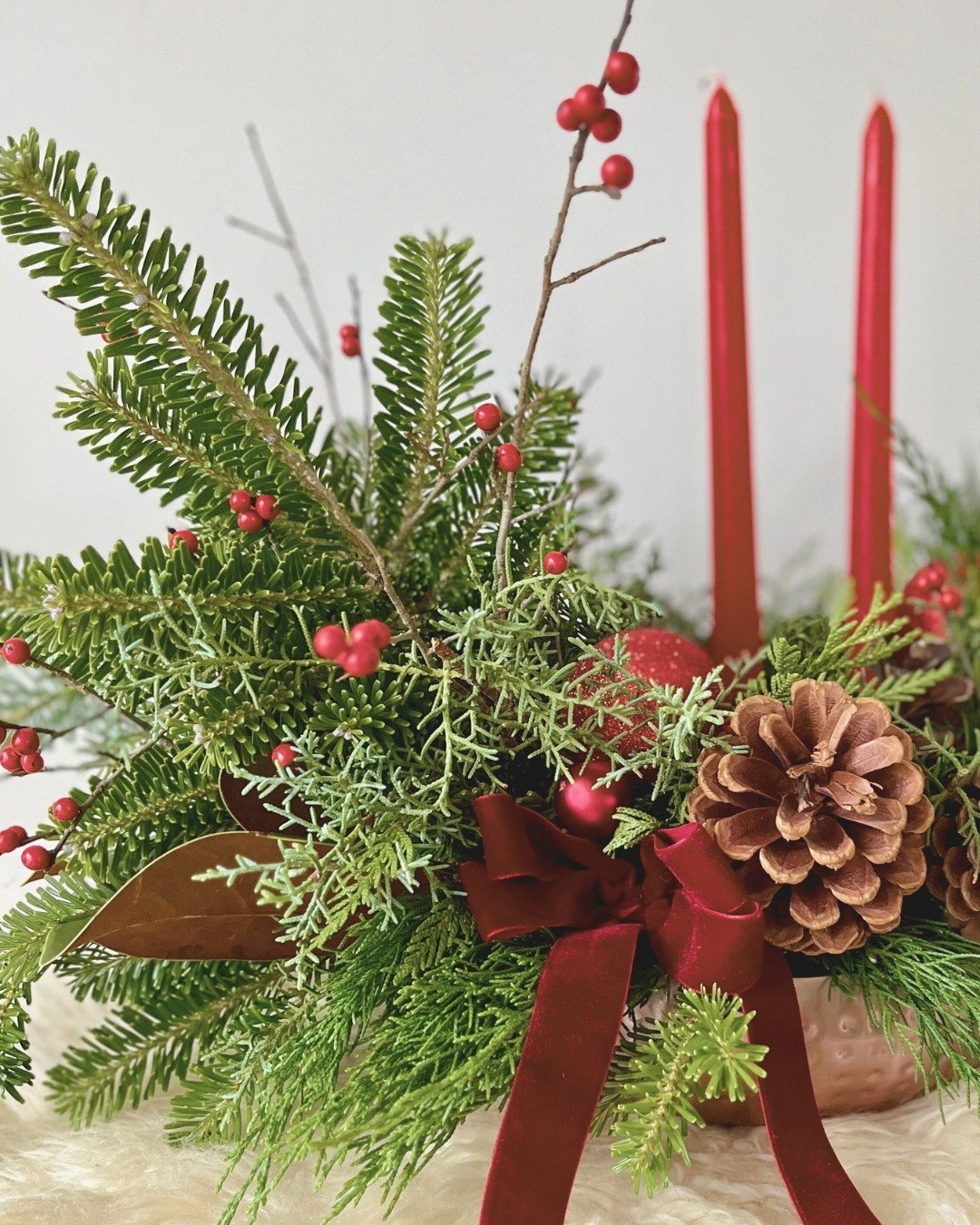 With the Holidays just around the corner our studio is in full swing! Think festive fresh evergreen wreaths and cozy candlelit centrepieces; red berries and the smell of evergreen, cedar, and pine branches, filling the air eeek! 

Whether you're plan
