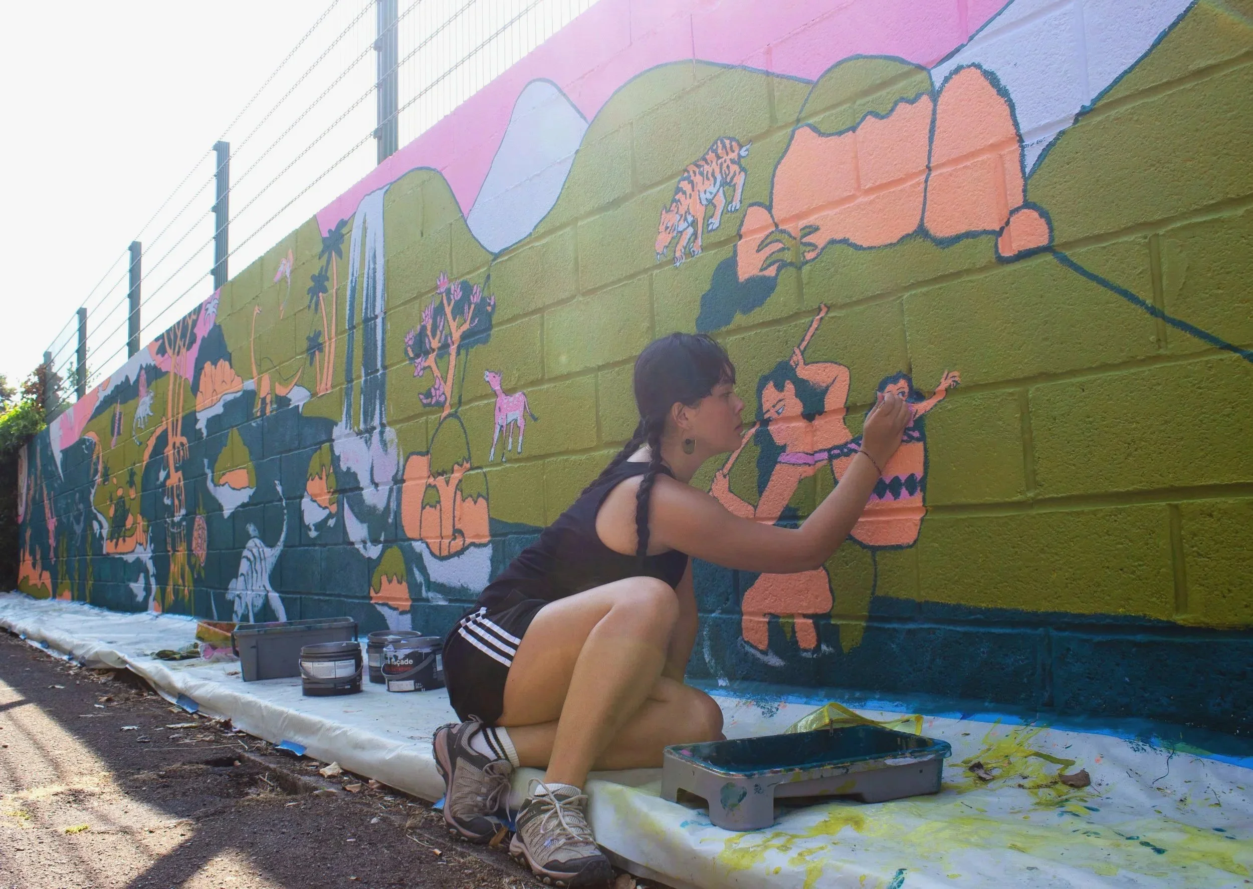 Painting a 15 meter mural for a kindergarden school
