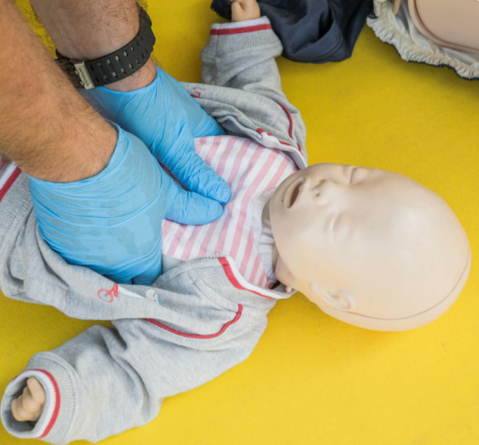 Infant manikin receiving cpr