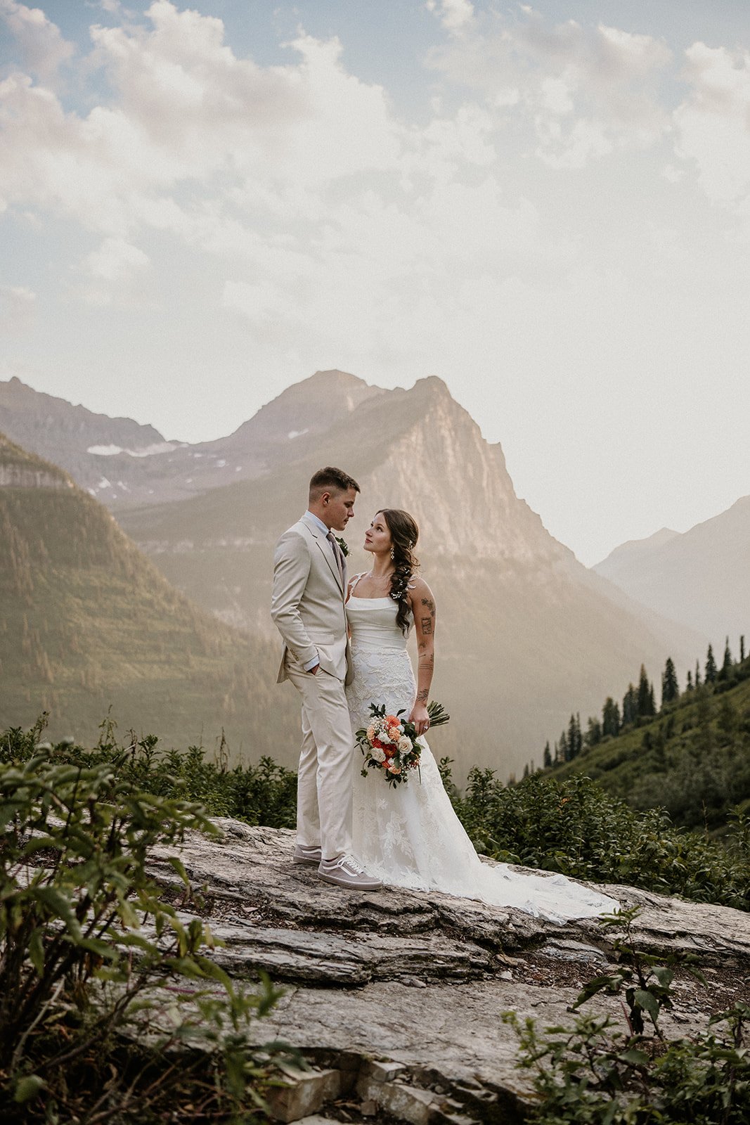 Glacier elopement couple golden hour