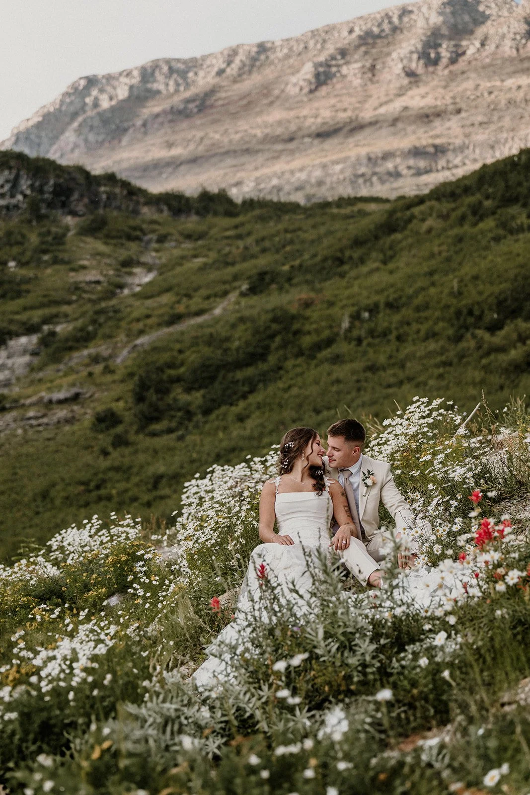 Glacier elopement couple at sunset