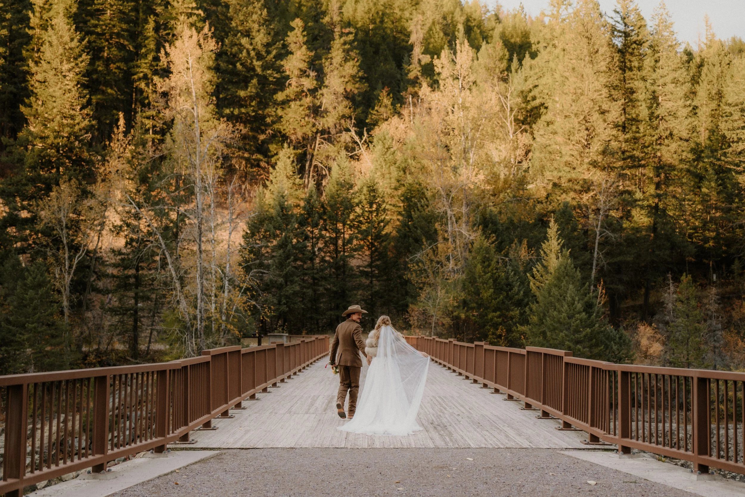 Intimate Glacier National Park elopement ceremony with mountain backdrop, photographed by Stan Todorov