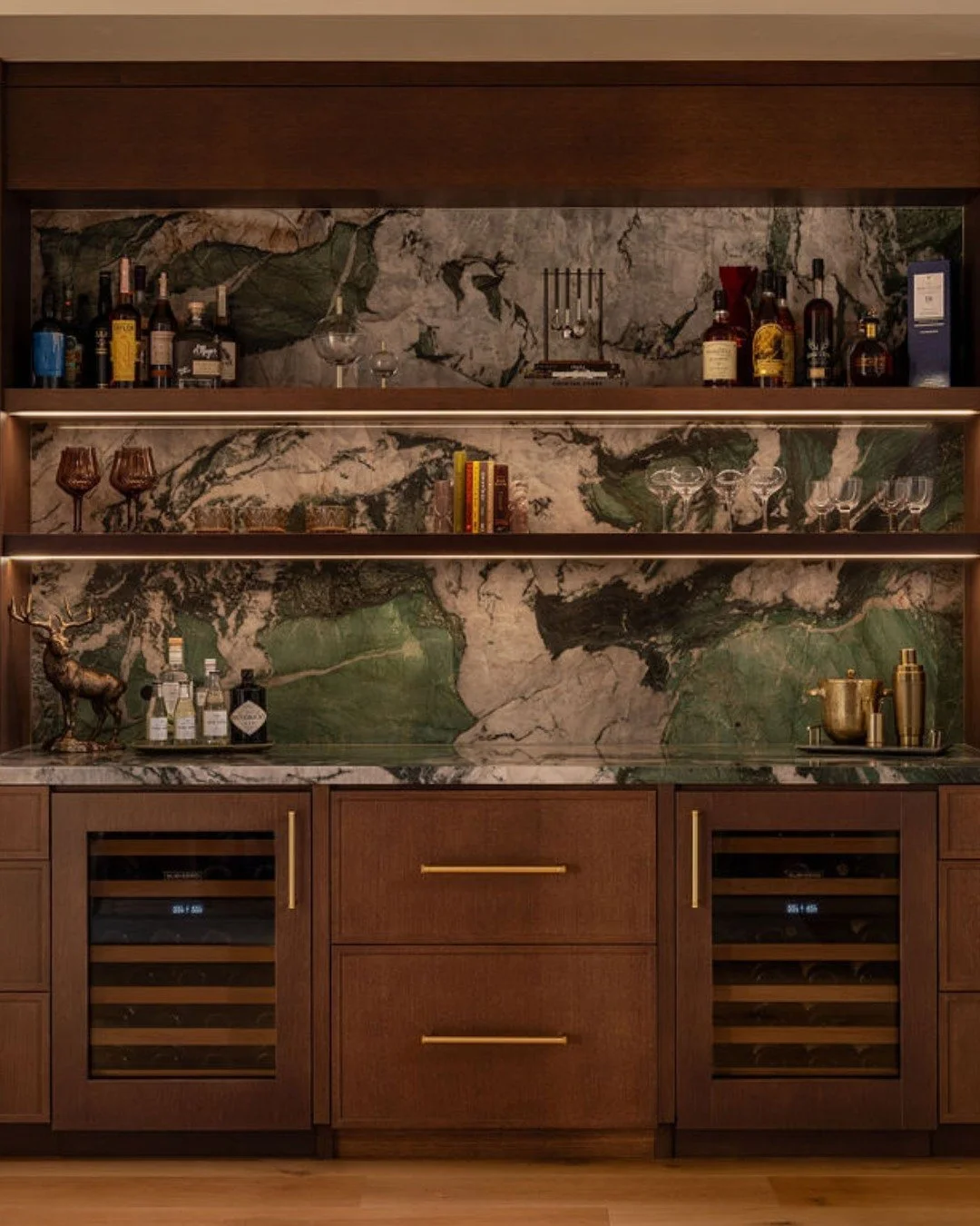 We&rsquo;ll let this one speak for itself. Oohs and aahs are welcome. 🤎 #MediterraneanRevival

Photography: @vivianjohnsonphoto
Builder: @gbmbuilder

#homebardesign #custommillwork #stonebacksplash #southbayinteriordesigner