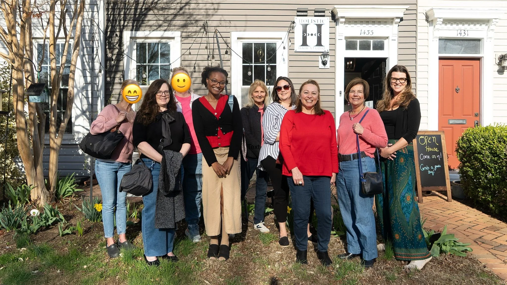 Group of 8 clients in front of Holistic Hair Studio Alexandria VA