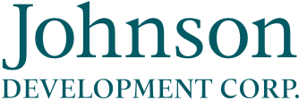Johnson Development Corp logo, master-planned real estate developer.