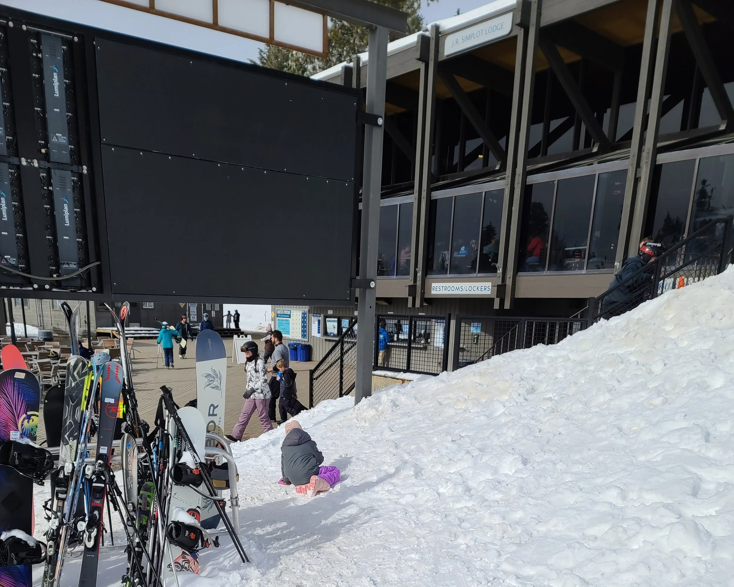 Kid playing outside the JR Simplot Lodge in Bogus Basin, ID