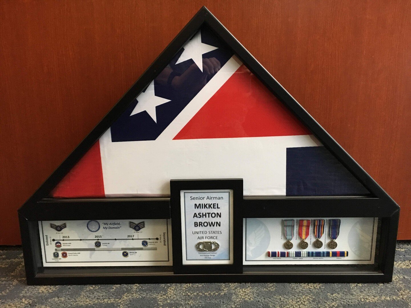 The first Service Chronobox (21018) recognizing 5 years of service. The tri-fold is the former Mississippi State flag. Recognizing a separating Airfield Manager NCO.

Note the introduction of the map depicting the member's duty locations