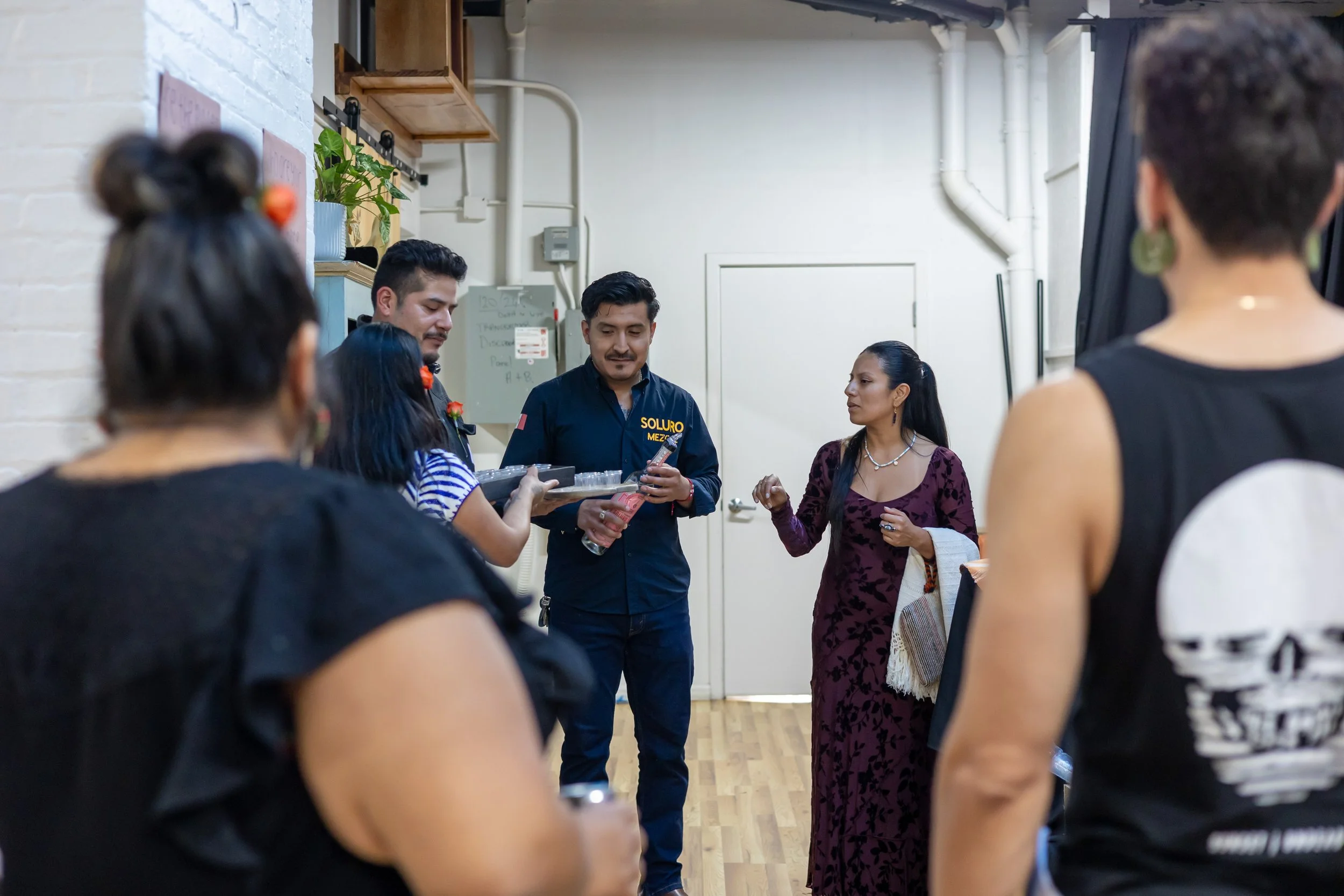 Padrino, madrina, volunteers, Luis Humberto from Soluro and Fabiola, Mi Oaxaca founder, conviviendo. 