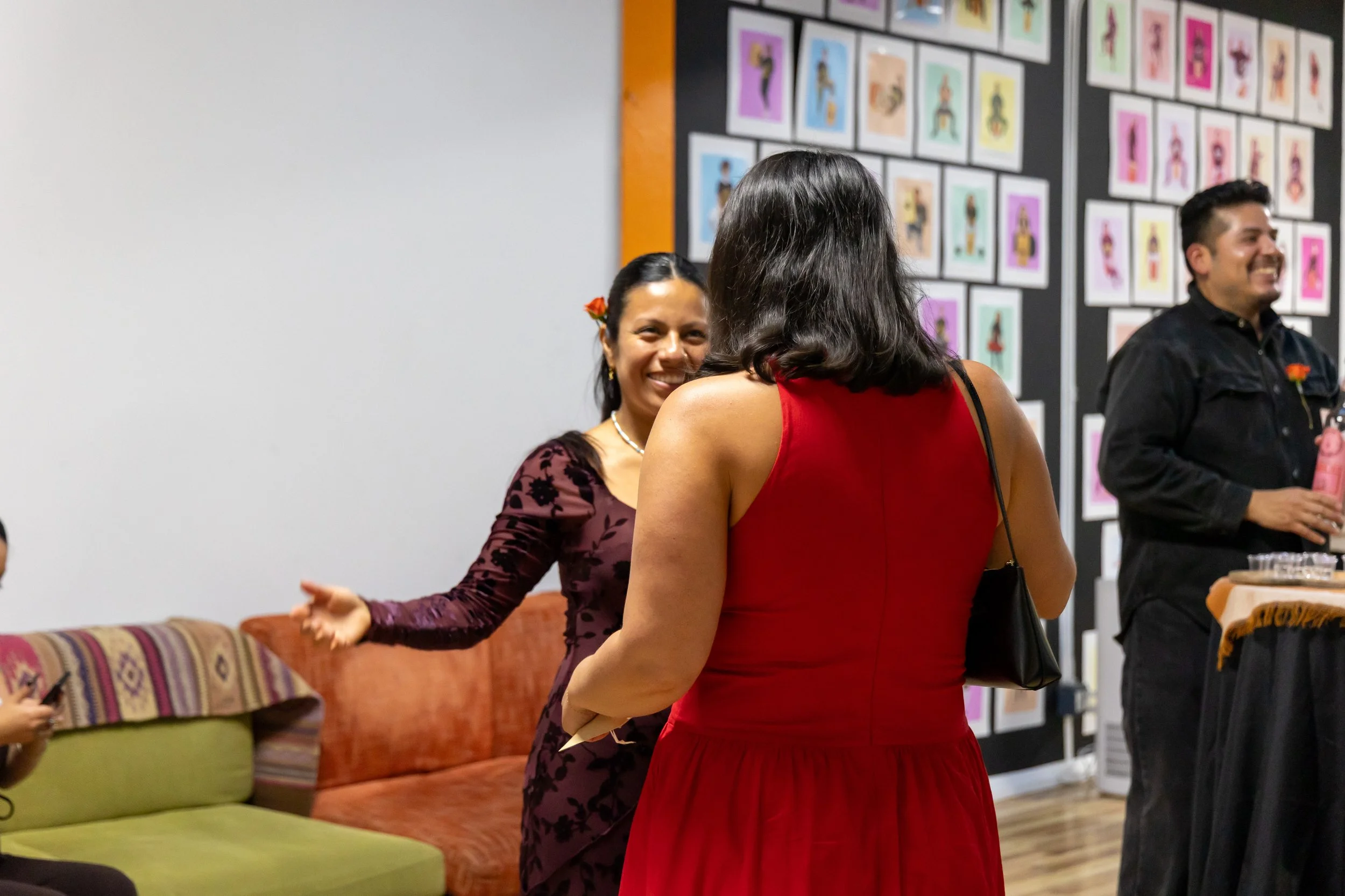 Fabiola, founder, greeting a guest at Gala-Guetza. 