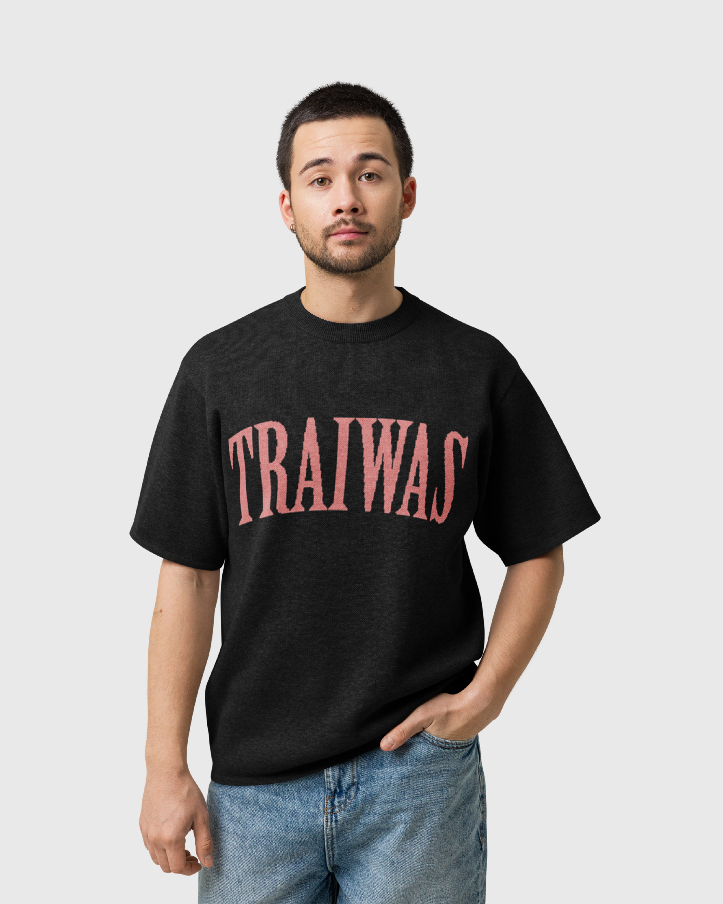 traiwas-product-knitted-t-shirt-coral-traiwas-logo-on-black-men-model.png