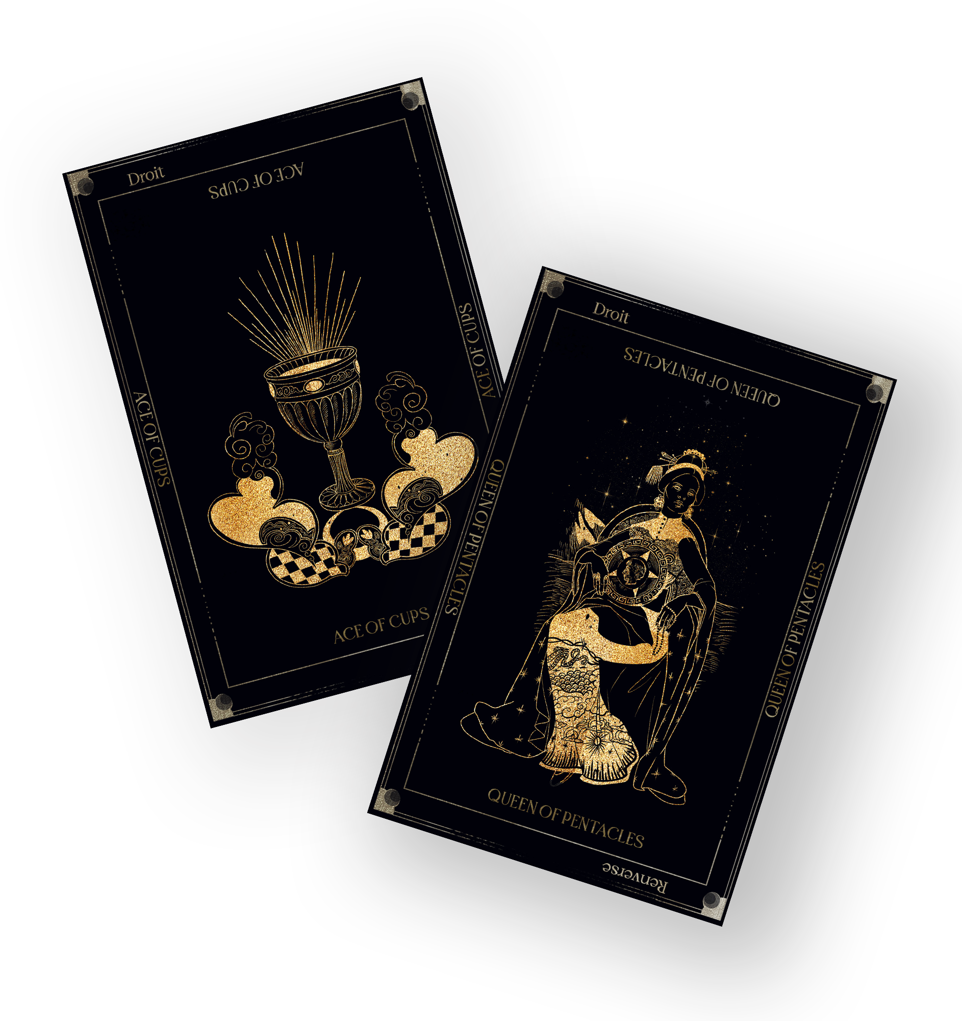 Two tarot cards, Queen of Pentacles and Ace of Cups, decorated in black and gold with celestial and mystical illustrations, placed on a dark surface.