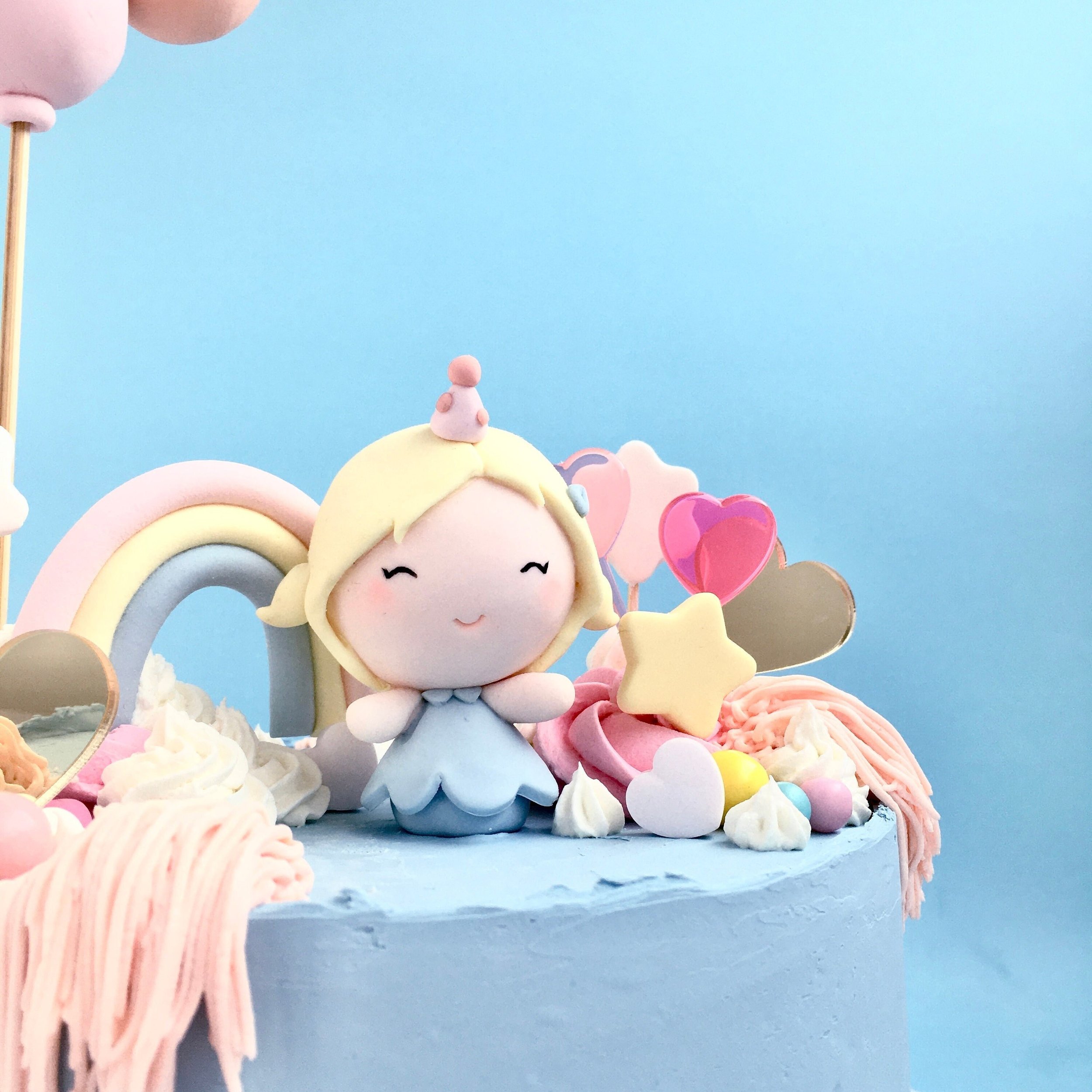 party girl cake topper creates happy dancing confetti popping birthday party vibes. Handmade from sugar for birthday memories to cherish.
