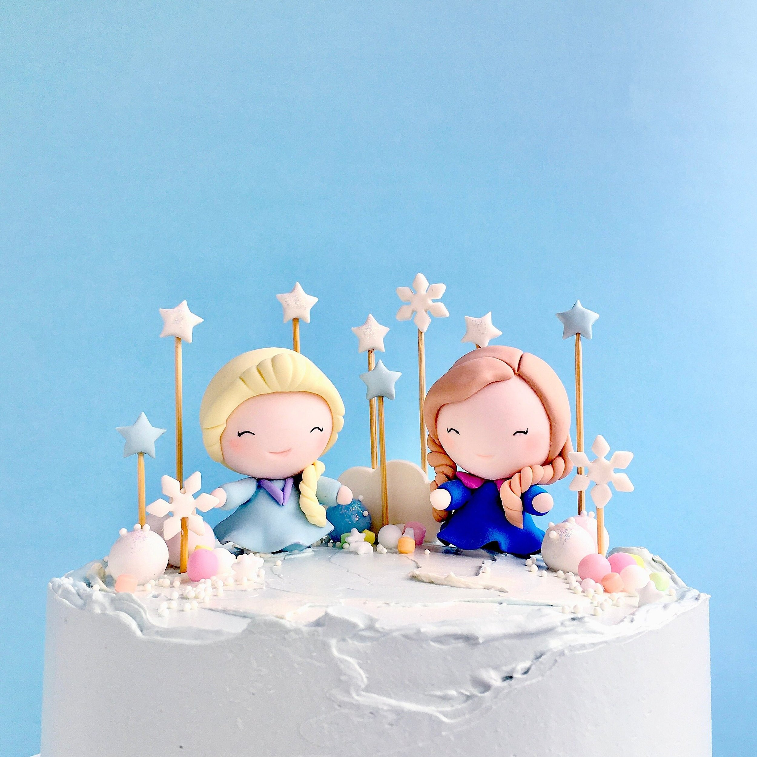Elsa or Anna Cake Topper from your favourite movie are magical addition to a frozen theme party