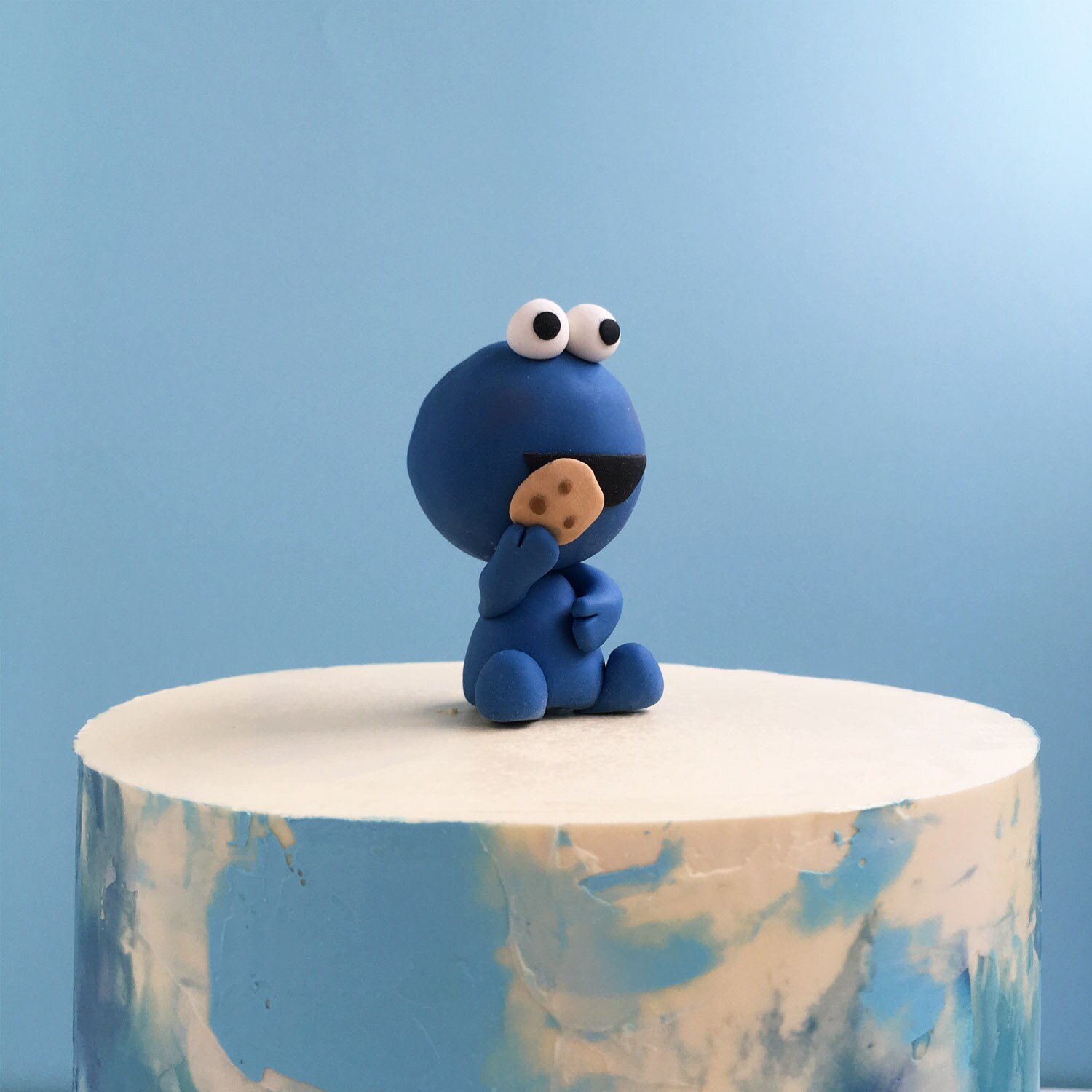 Cookie Monster Specialty Cake Topper is by far the most relatable who doesn’t love a cookie nom nom
