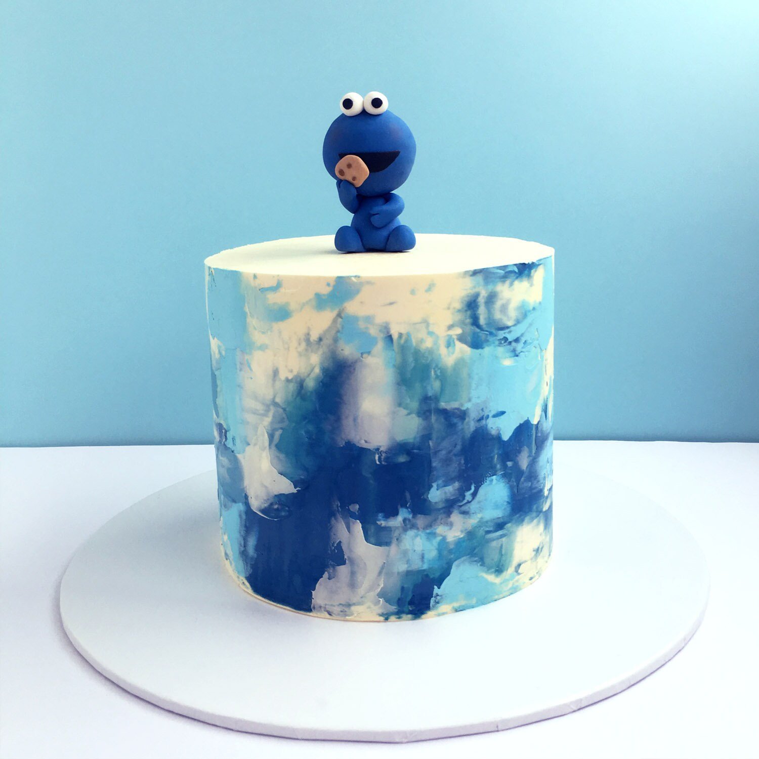 Cookie Monster Specialty Cake Topper is by far the most relatable who doesn’t love a cookie nom nom